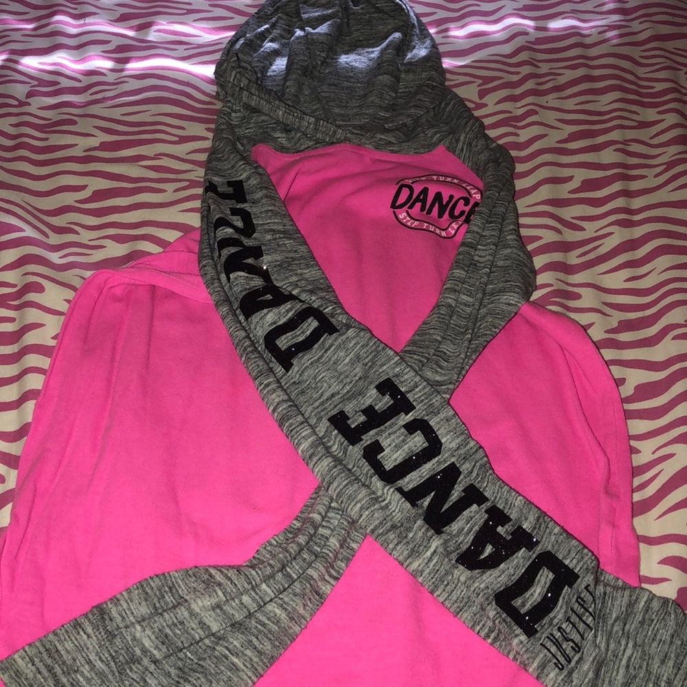 a long sleeve shirt with a hood